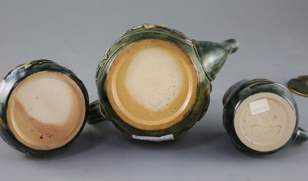 A Royal Doulton fish and pond weed three-piece tea set, designed by George Tinworth, made c.1905,